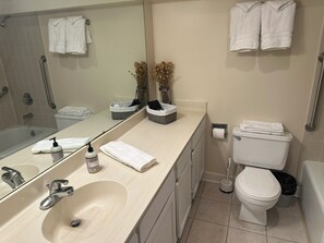 Hair dryer, towels, soap, shampoo