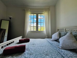 4 bedrooms, desk, iron/ironing board, travel cot