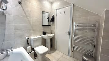 Hair dryer, towels, soap, shampoo