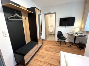 Standard Single Room, Private Bathroom (Einzelzimmer Komfort) | Laptop workspace, cribs/infant beds, free WiFi, bed sheets