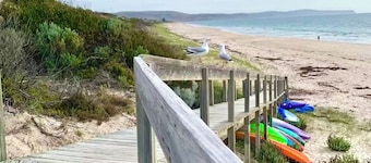 Sleeps 10, walk to beach, three living areas. Perfect for extended families.
