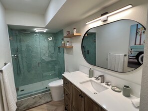 Shower, hair dryer, towels, soap