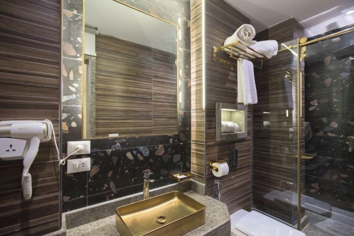 Bathroom | Shower, hair dryer, slippers, bidet