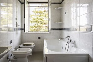 Shower, jetted tub, hair dryer, bidet
