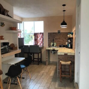 Fridge, coffee/tea maker, electric kettle, toaster