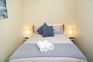 2 bedrooms, desk, iron/ironing board, travel crib