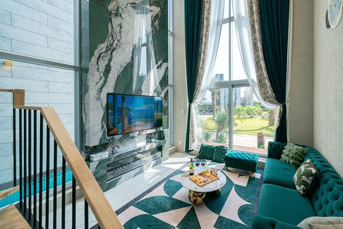 EUDAIMONIA E01 | Living area | 65-inch Smart TV with digital channels, Netflix, toys