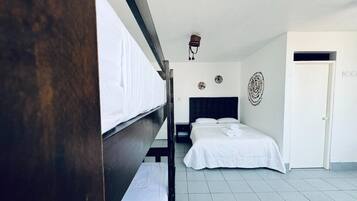 Family Quadruple Room, Patio, Courtyard View | Desk, free WiFi