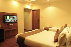 Executive Triple Room | Iron/ironing board, free WiFi, bed sheets - Sai Neem Tree Hotel (Rahata)
