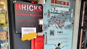 A hostel named BRICKS with a signboard indicating it is located in Cameron Highlands. - Bricks Cameron Hostel (Tanah Rata)