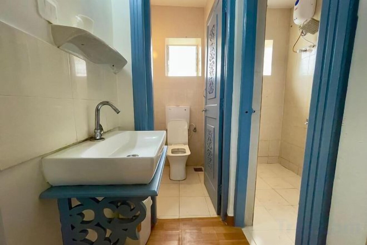 Bathroom | Shower, rainfall showerhead, hair dryer, bathrobes