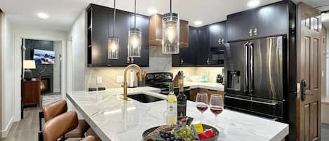 Coffee/tea maker, fridge, microwave, oven
