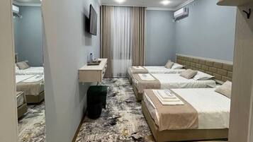 Standard Triple Room, City View | Laptop workspace, free WiFi