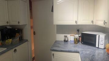 Apartment | Private kitchen | Fridge, microwave, oven, stovetop