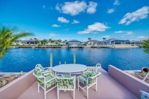 Outdoor dining - Gulf Access Retreat with Heated Pool (Cape Coral)
