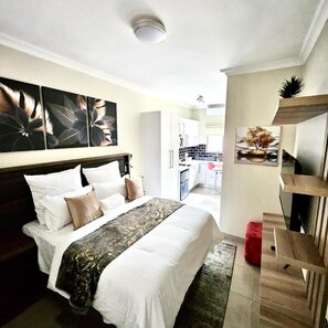 Quarto conforto | Espaço de trabalho para notebook, Wi-Fi de cortesia