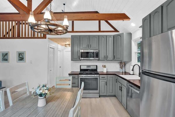 Fridge, microwave, oven, stovetop - Pocono Chalet | Vaulted Pine Ceilings | Pet Friendly | Hot Tub (Albrightsville)