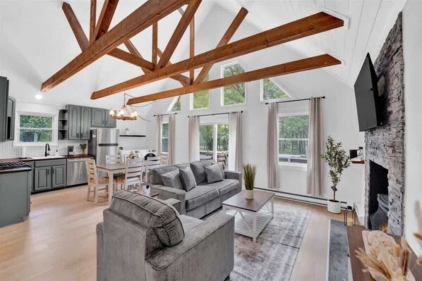 TV, fireplace - Pocono Chalet | Vaulted Pine Ceilings | Pet Friendly | Hot Tub (Albrightsville)