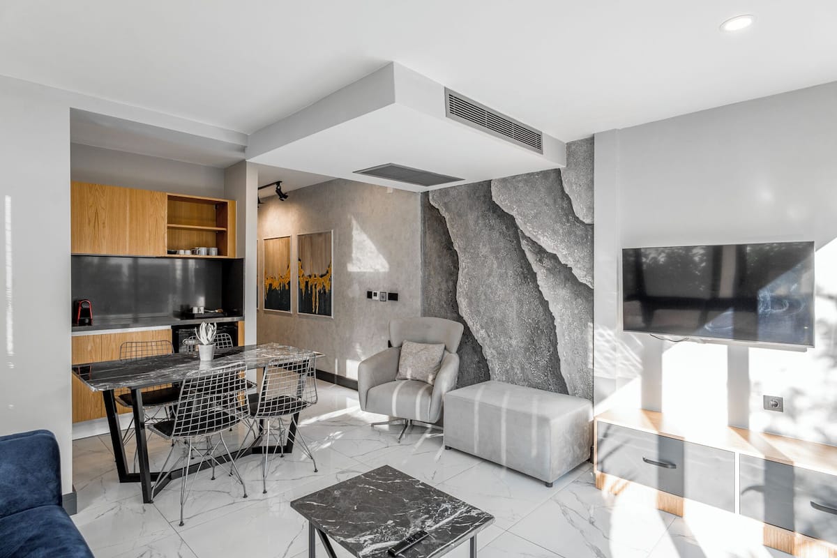 Superior Duplex, Balcony, Garden View | Living area | 43-inch plasma TV with satellite channels