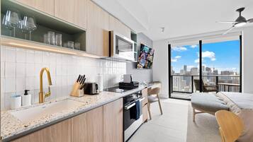 Luxury Studio, City View | Private kitchenette | Espresso maker, coffee/tea maker, dining tables