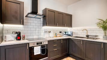 Apartemen | Area keluarga | TV layar datar