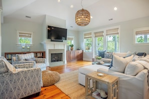 Smart TV, fireplace, books