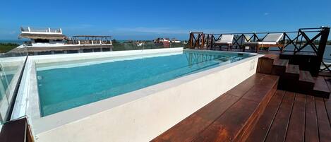 Outdoor pool, open 8:30 AM to 9:30 PM, sun loungers