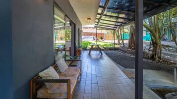 Deluxe Cottage, Garden View | Terrace/patio