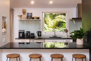 Fridge, microwave, oven, stovetop - Stylish Remuera Retreat| by Furnished Rentals (Auckland)
