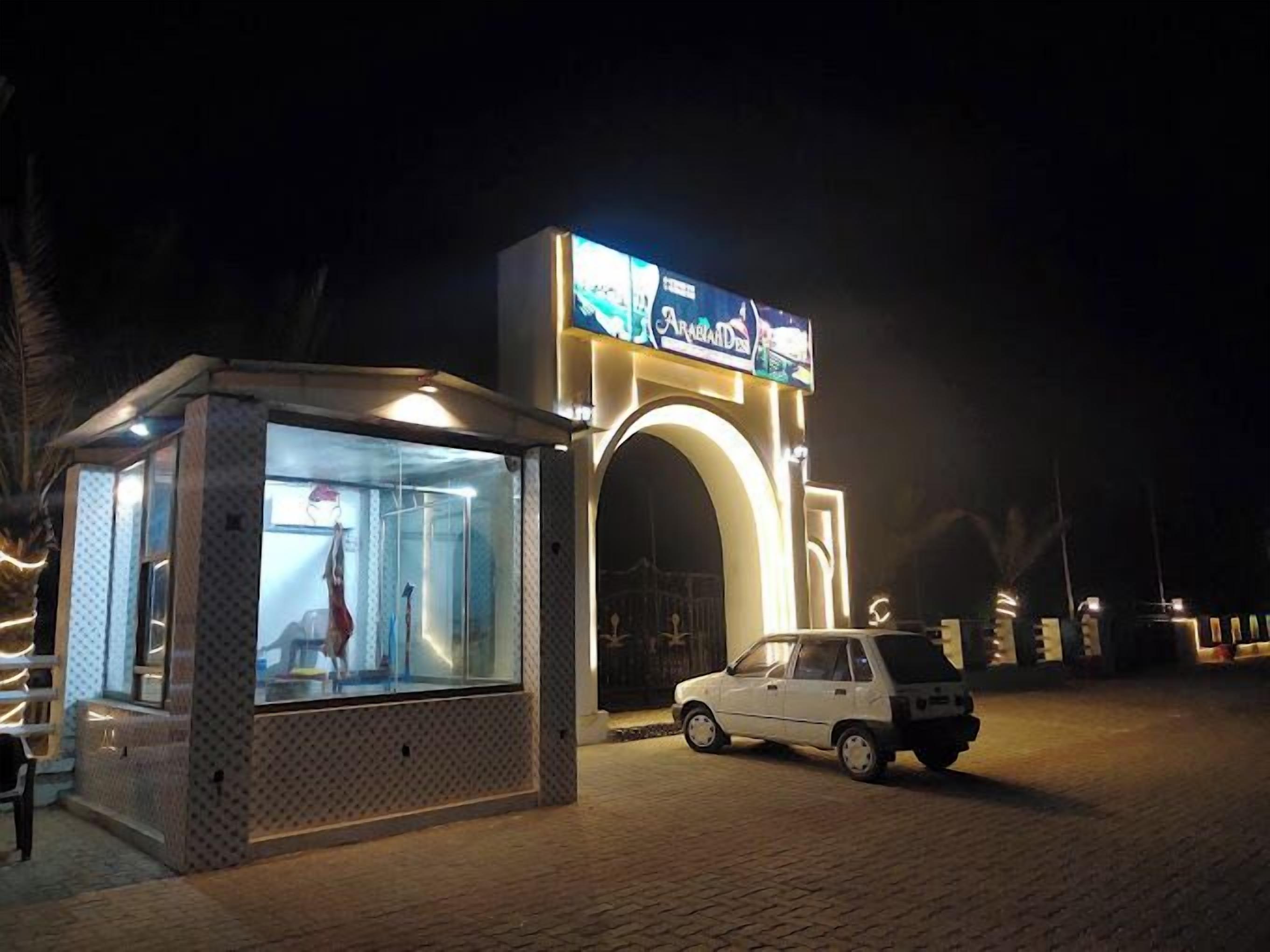 A well-lit building with a large sign reading "Arabian Dream."