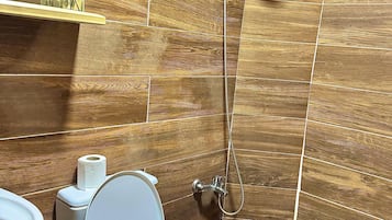 Shower, towels, soap, shampoo