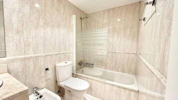 Hair dryer, towels, soap, toilet paper