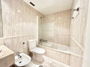 Hair dryer, towels, soap, toilet paper