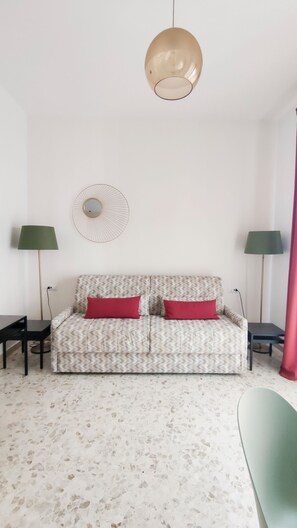 Studiosvit Superior - utsikt mot staden | Vardagsrum | 42-tums smart-tv med satellitkanaler