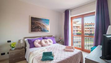 1 bedroom, desk, iron/ironing board, travel cot
