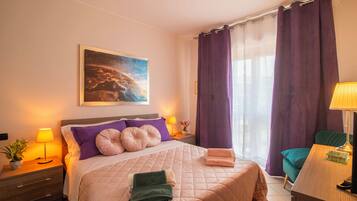 1 bedroom, desk, iron/ironing board, travel cot