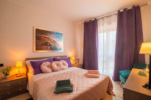 1 bedroom, desk, iron/ironing board, travel crib