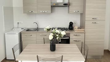 Comfort Apartment, Terrace | Private kitchen | Full-size fridge, oven, stovetop, espresso maker