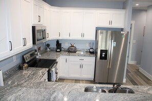 Private kitchen - Soundside Sunset & Beach Getaway w/ Tesla charger (Surf City)