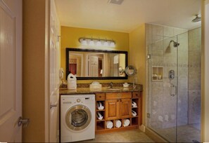 Shower, hair dryer, towels, soap
