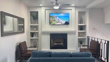 Smart TV, fireplace, foosball