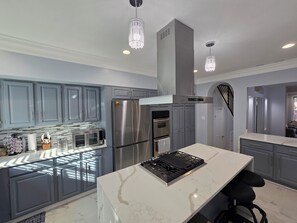 Fridge, microwave, oven, stovetop - Charming 3-bedroom by Convention Center DC  WiFi, AC, Free off street Parking  (Washington)