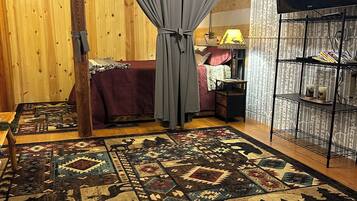 1 habitación, tabla de planchar con plancha y ropa de cama