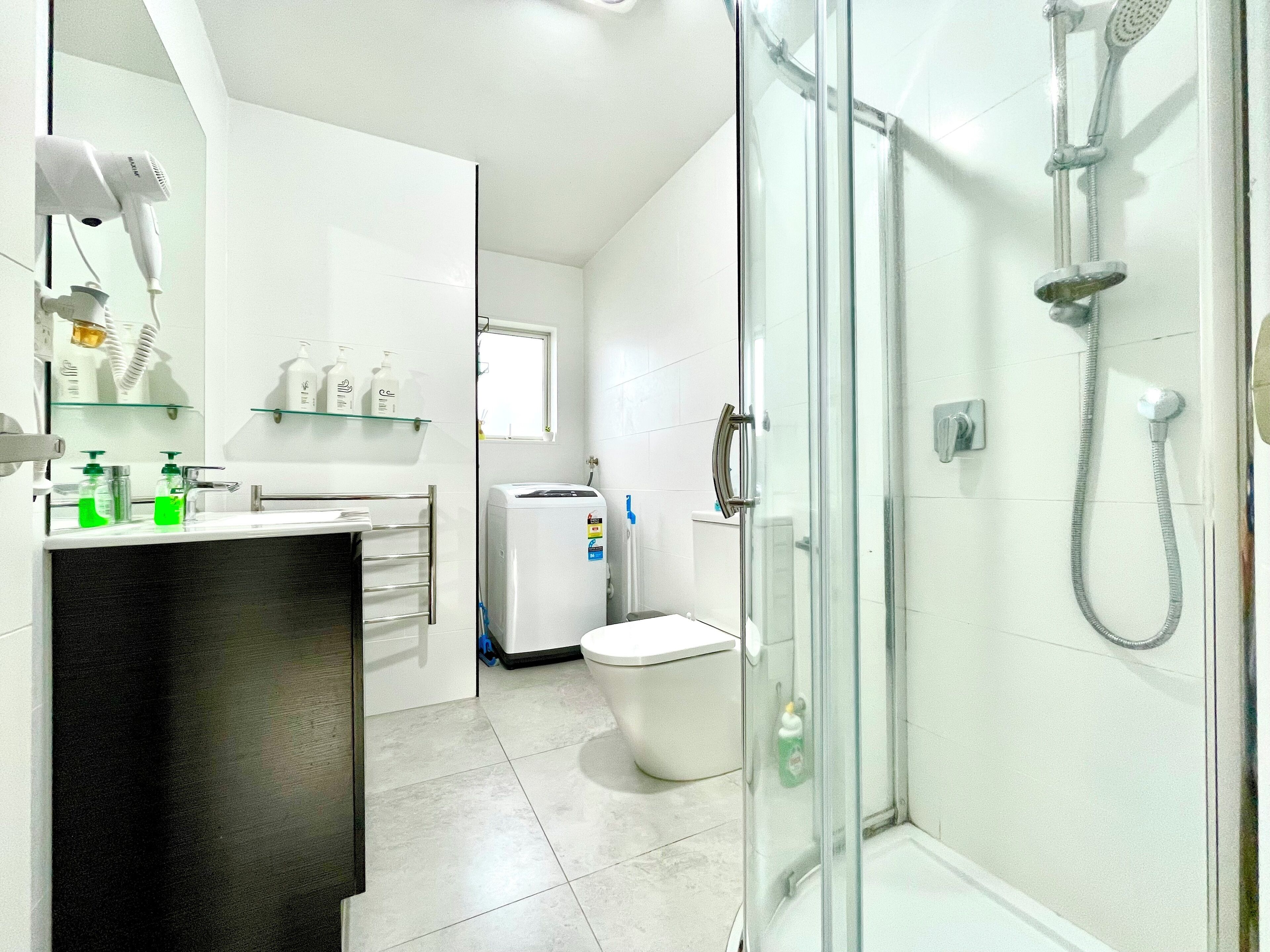 Shower, hair dryer, towels, soap