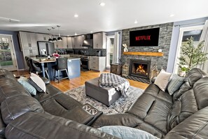 Smart TV, fireplace, table football, books