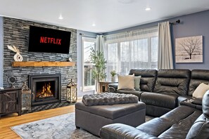 Smart TV, fireplace, foosball, books