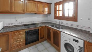 Apartament | Cuina privada | Frigorífic, microones, forn i rentaplats