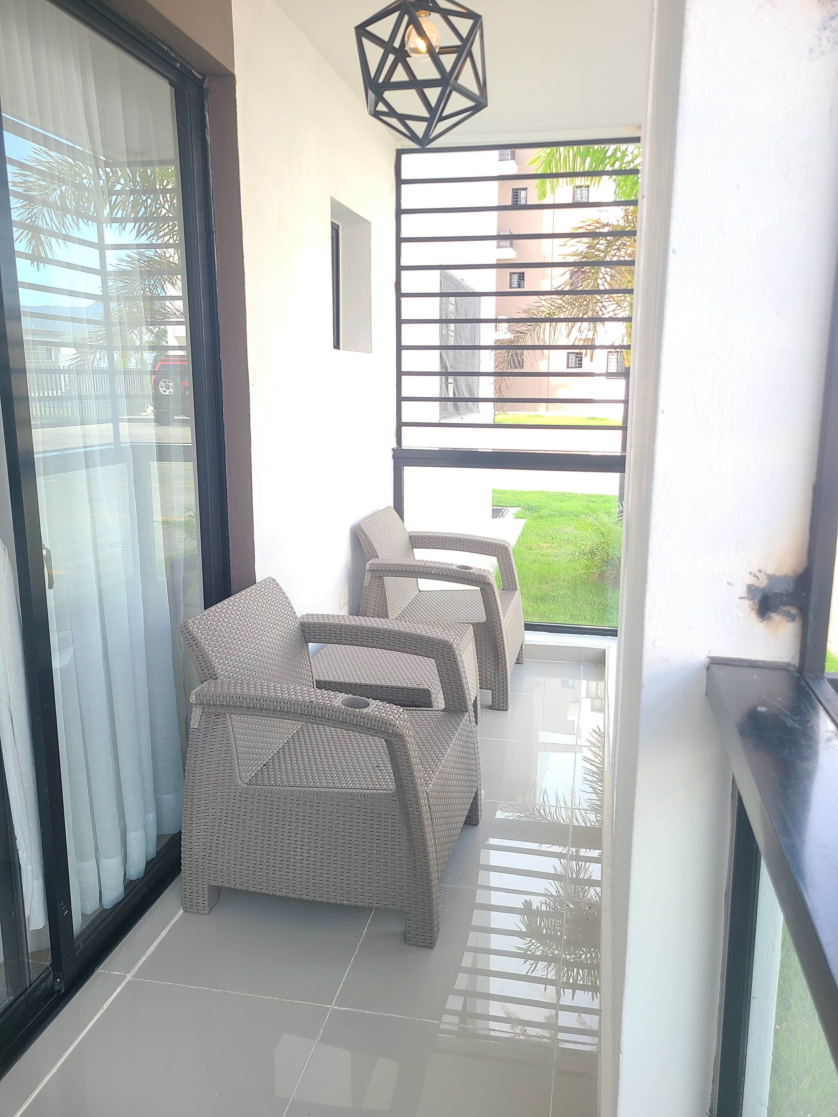 Lyxlägenhet - utsikt mot trädgården | Balkong