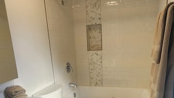 Hair dryer, towels, soap, shampoo