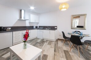 Appartement | Cuisine privée | Chaise haute